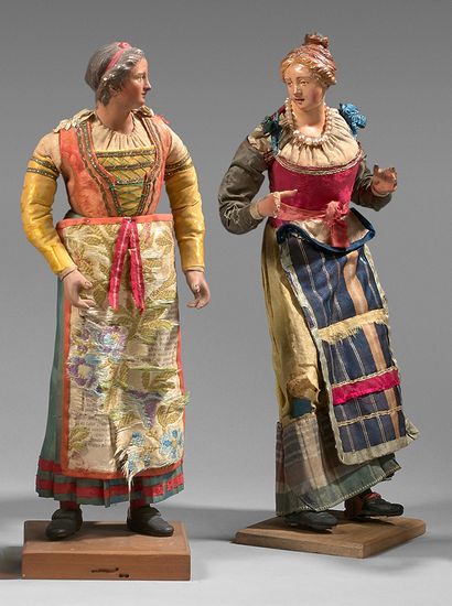 null Two women in polychrome terracotta, one with a pearl necklace.
Height : 33 ...