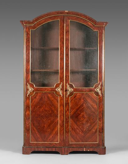 null Large rosewood veneered display bookcase, opening with two half-glazed leaves....