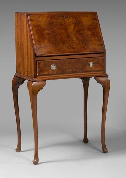 null Mahogany sloping desk, opening with a flap and a drawer. Cambered legs.
England,...