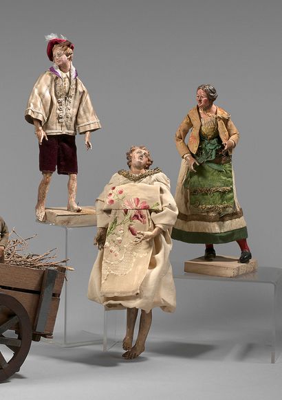 null Three statuettes including an angel, in polychrome terracotta.
Height : 23 ...