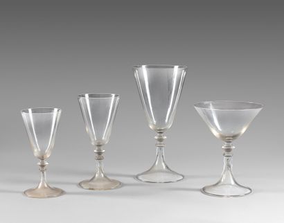 null 
Part of a crystal stemmed glass set, including: 17 champagne glasses, 10 water...