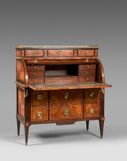 null Scriban cylinder desk in rosewood veneer with butterfly wings in filleted frames....