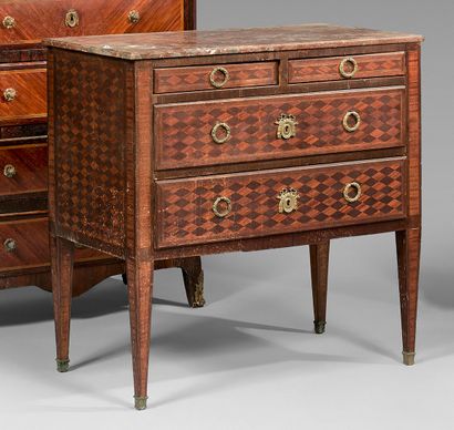 null Chest of drawers in marquetry of cubes without bottom opening to four drawers...