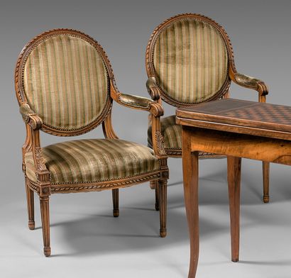 null Pair of beechwood medallion flat back armchairs carved with twisted ribbons...
