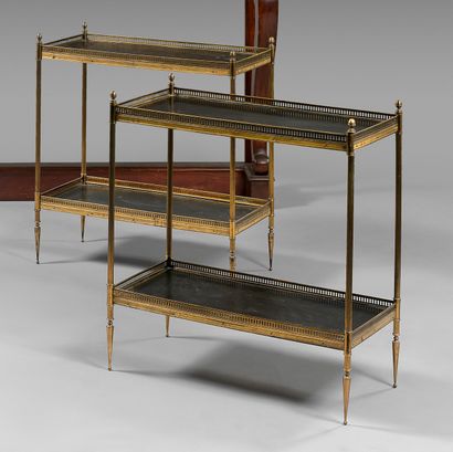 null Pair of tables "bout de canapé" with two leather tops, with gilt metal openwork...