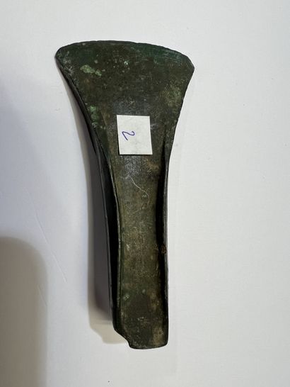 null 
Axe with edges and straight blade


Bronze with green patina. 




France,...