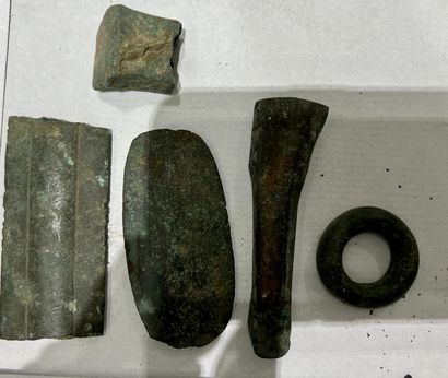 null 
Lot including a fragment of a sword blade, a socket gouge, a half ring with...