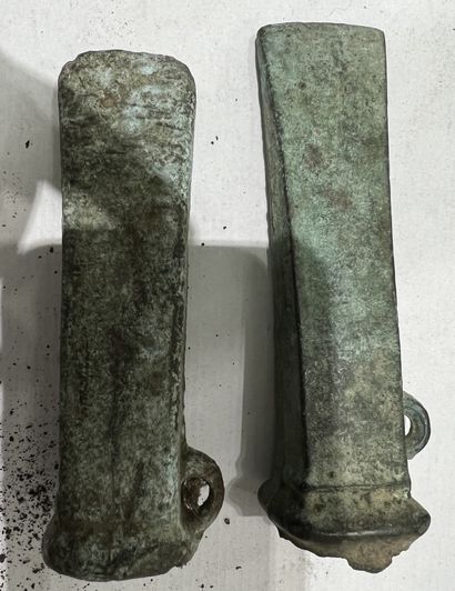 null 
Lot of two axes with socket and side ring of Armorican type.

Bronze with green...