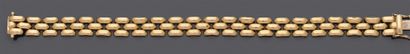 null Bracelet articulé en or jaune 750 millièmes.
(Usure).
Longueur : 18,5 cm
Poids...