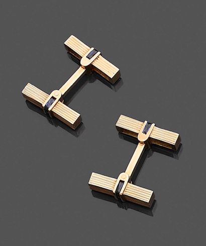 null Pair of cufflinks in yellow gold 750 thousandths, the ends of rectangular shape...