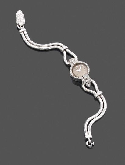 JAEGER Le COULTRE. Lady's bracelet watch in 18k (750) white gold and diamonds. Case...