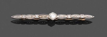 null Lot in gold 585 thousandth comprising: a ring, the oval bezel set with diamonds...