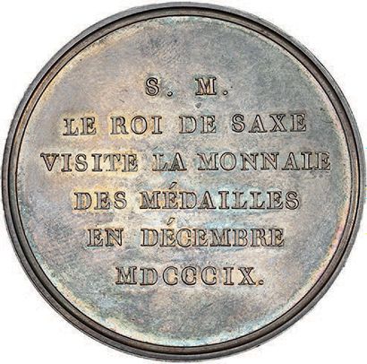 null 1809
Le Roi de Saxe visite la Monnaie des médailles.
Argent. 41 mm.
Br. 883...