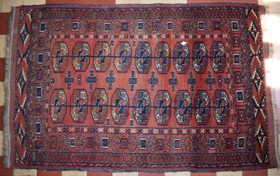 null Bukhara RUG on a wine lees background - 150 x 95 cm.

A small kilim RUG with...