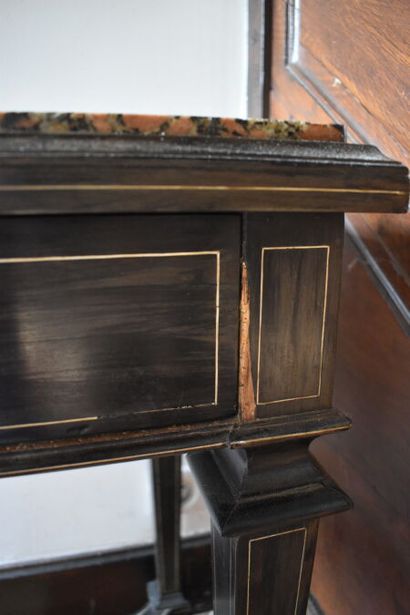 null Desk table in blackened wood veneer and clear net, opening to a drawer. Feet...