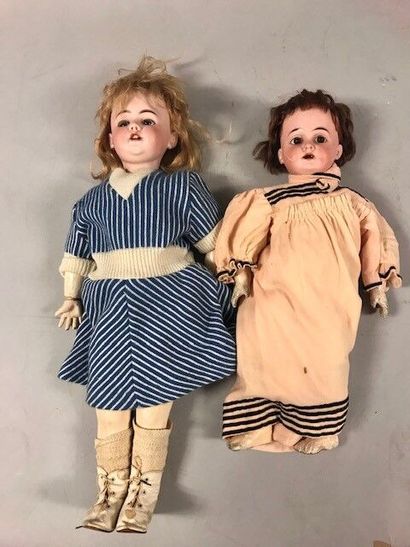 null German doll, with bisque head, open mouth, marked "DEP 44-28".

Brown fixed...