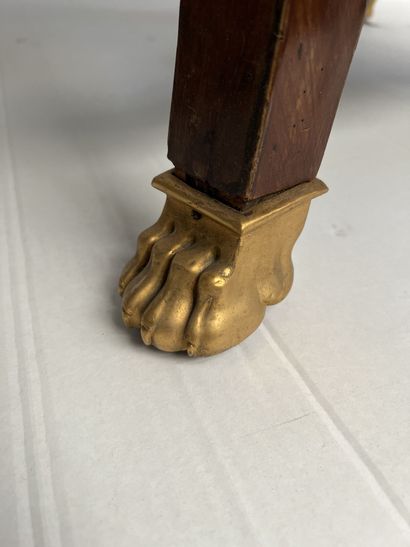 null TRIPOD TABLE in mahogany with gilded bronze claw feet.

Top of small black granite.

Beginning...