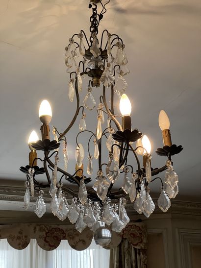 null Wrought iron and crystal chandelier with six lights.

height. 70 cm approxi...