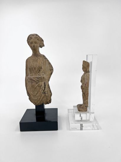 LOT composed of a fragmentary statuette representing...