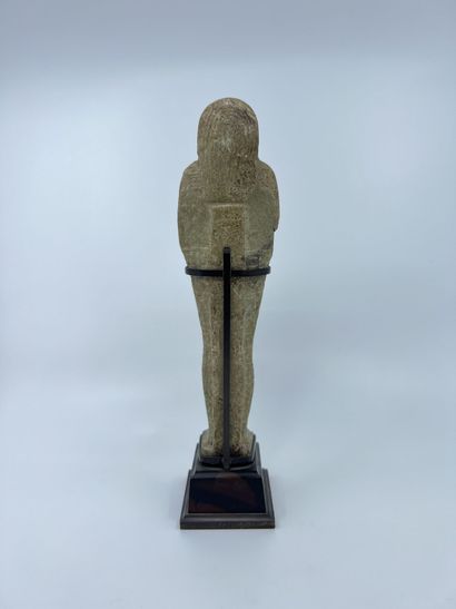 null OUSHEBTI mummiform inscribed with a text in hieroglyphic characters on 9 registers....