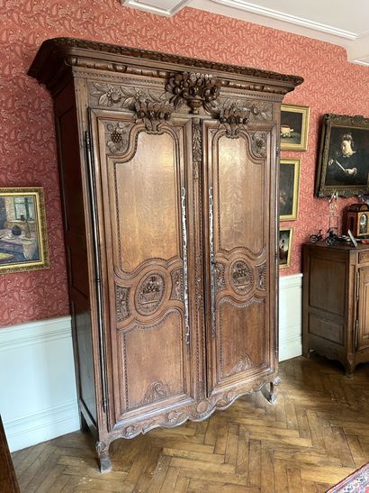 null NORMANDE CABINET in oak carved with flowers and bunches of grapes opening with...