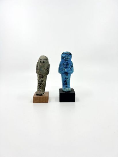 null LOT composed of two oushebtis inscribed with a text in hieroglyphic characters...