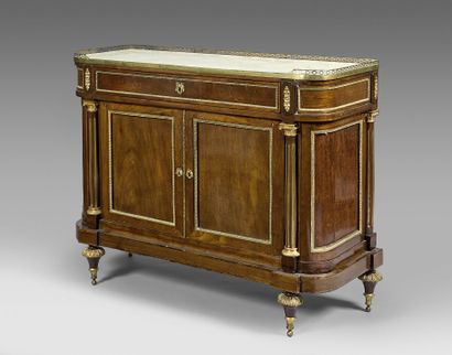 null DESSERTE in mahogany and gilded bronze moldings opening to a drawer surmounting...