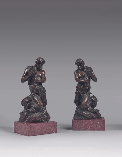 DEUX STATUETTES en bronze patiné : Triton...