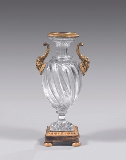 null Ovoid vase on pedestal in cut crystal with twisted gadroons and engraved lanceolate...