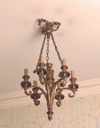 null Small chandelier with six lights around a quiver in gilded bronze. Suspension...