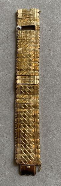 Bracelet large et articulé en or jaune 750...