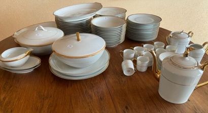 null PART OF TABLE SERVICE in white porcelain with gold fillets.
(Models slightly...