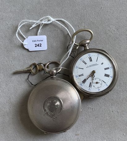 null Two guilloche silver pocket watches, keyed and wound from the bottom, one in...