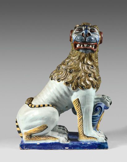 null ROUEN
Large statuette of a seated lioness in polychrome earthenware, the left...