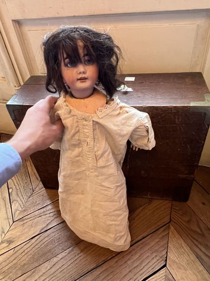 null GERMAN DOLL
with bisque head, open mouth, marked 44-30
Length : 55 cm 
We join...