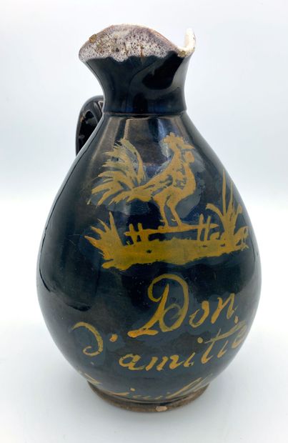 null Normandy, glazed earthenware cider pitcher, black background with yellow decoration...