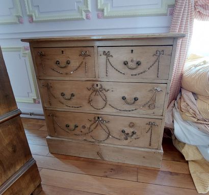 null Wooden COMMODE with garlands decoration opening to 4 drawers on 3 rows.
Louis...