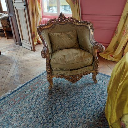 null ROOM FURNITURE in carved and gilded wood rocaille including A SOFA and A PAIR...
