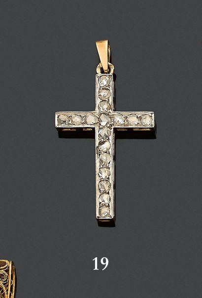 Cross pendant in 750 thousandths yellow gold...