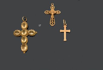 Lot comprising: three pendant crosses in...