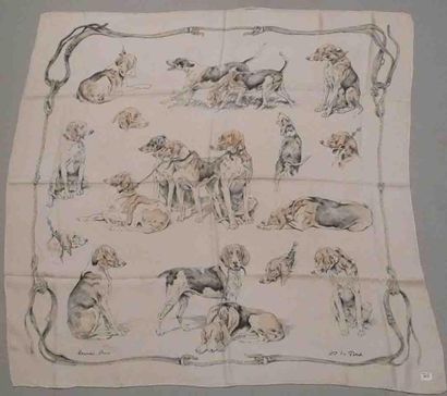 HERMÈS Paris, made in France Carré en soie imprimée à décor de dessins de chiens...