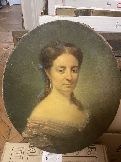 null 19th century FRENCH ECOLE.
"Portrait of a Woman with a Blue Ribbon"
Oil on oval...