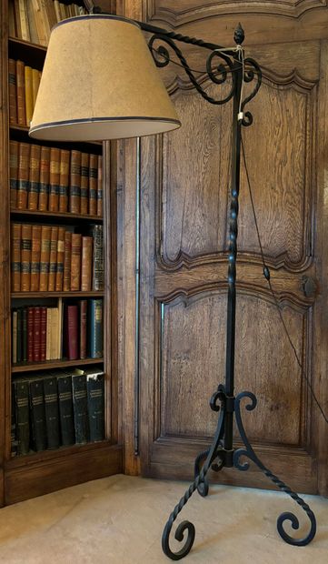 null REUNION OF THREE LAMPADAIRES and a READER in wrought iron and gilt brass.
With...
