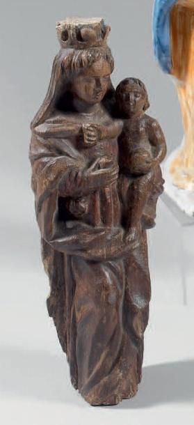 null Statuette de Vierge à l'Enfant en chêne sculpté anciennement polychrome. Île-de-France...
