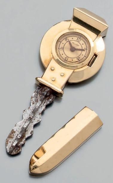 null Précieuse clef de porte en acier montée en or jaune et présentant une petite...