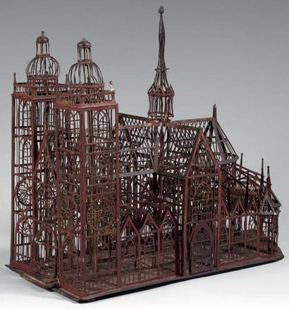 null Cage à oiseaux en fer découpé et laqué rouge en forme d'église gothique. XIXe...