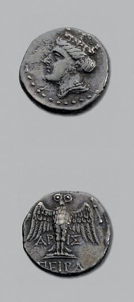 null Drachme (Ve-IVe siècle av. J.-C.). 5,63 g. Tête de Tyché à gauche, coiffée d'un...