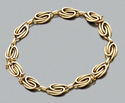 null Bracelet articulé en or jaune 18k, les maillons de forme ovale entrelacés. Poids...