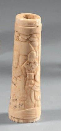 Ensemble en ivoire comprenant un manche sculpté...