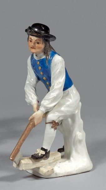 ALLEMAGNE, MEISSEN Statuette à décor polychrome et or représentant un bûcheron tenant...